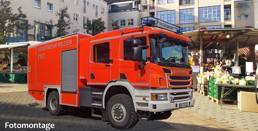 Feuerwehr goes Wochenmarkt: Löschfahrzeug zwischen Obstständen und Käsetheke